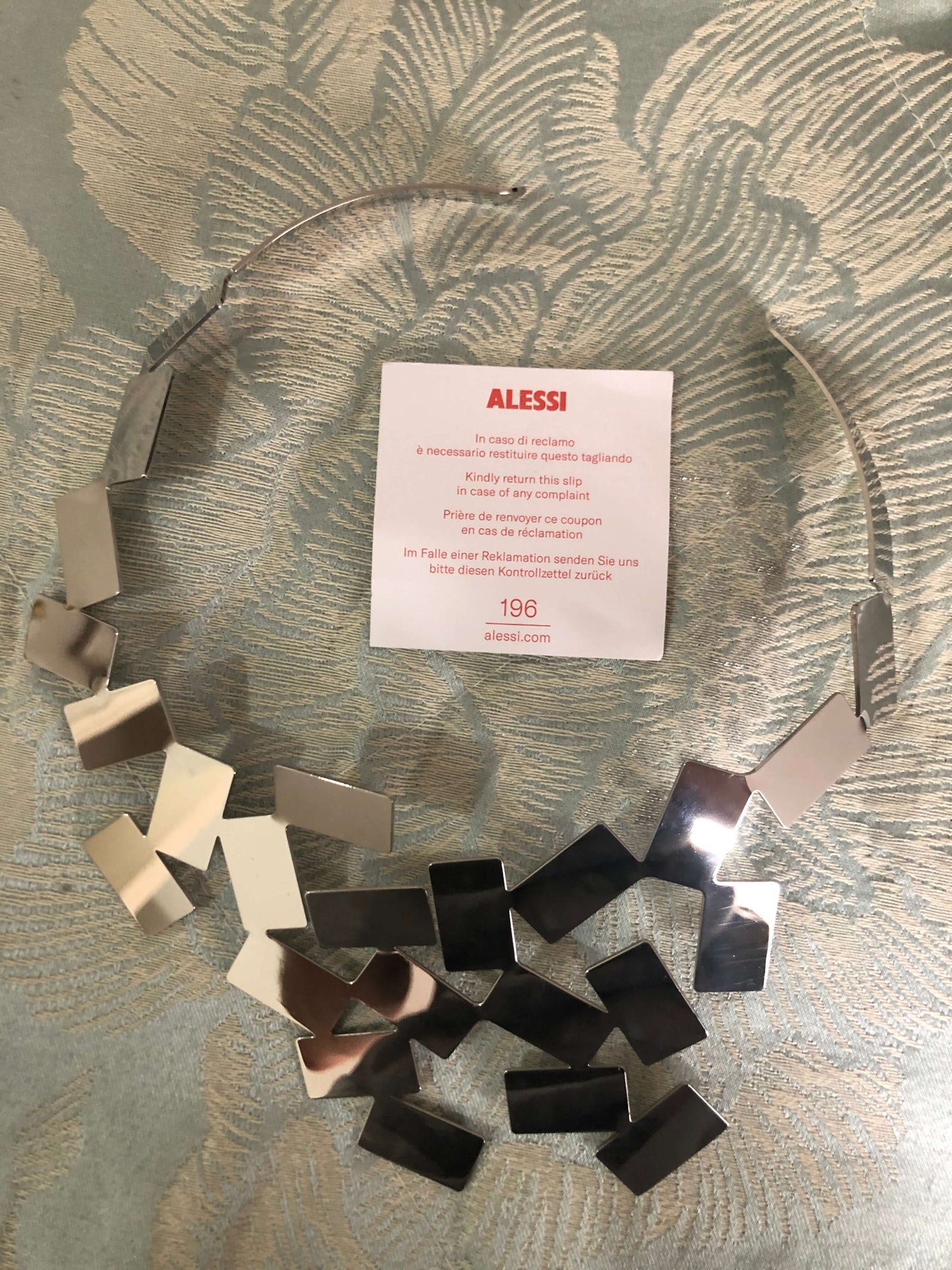Alessi 'Fiato sul Collo' Necklace & 'Alisei' Earrings — Mario Trimarchi, 2011 | Mirror-Polished Stainless Steel Set